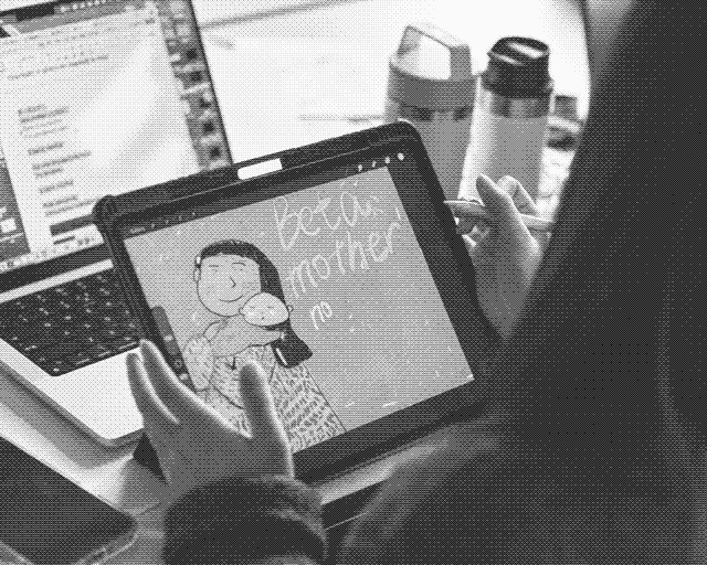 Sketching a prototype on a tablet for project Beta Mother.